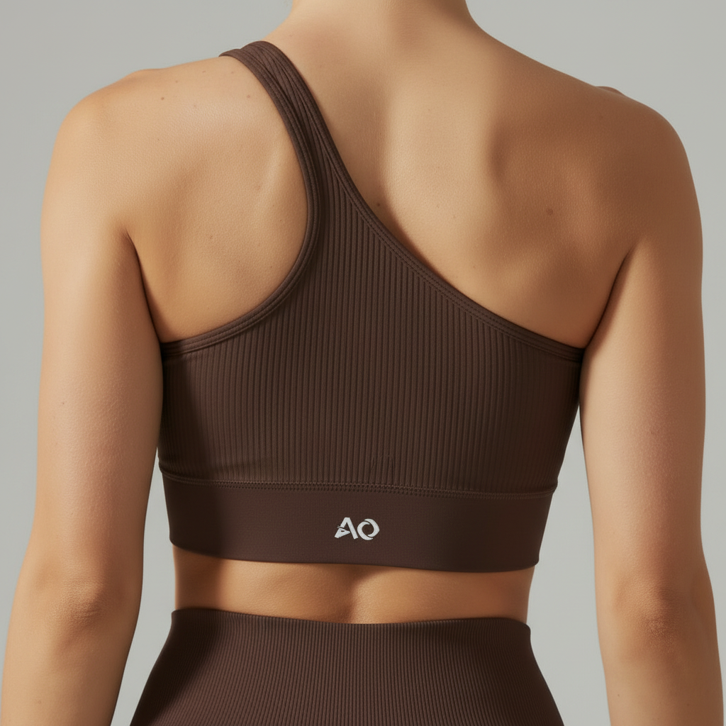 Close-up sports bra ribbed texture and AO logo