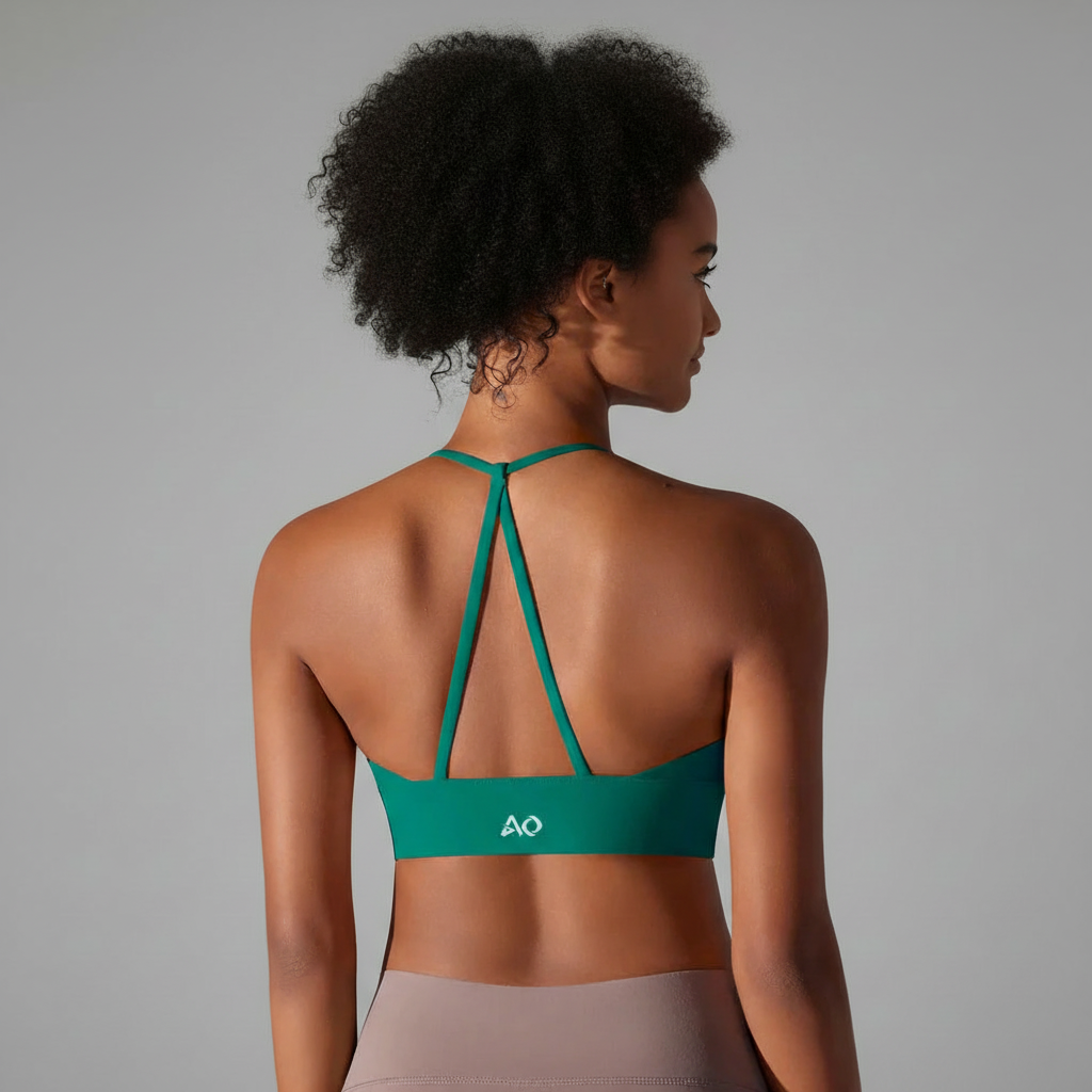 Teal green activewear with crossed back straps 1200x1200